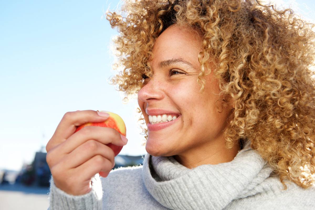 Woman smiling with dental veneers