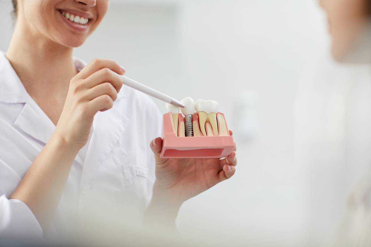featured image for causes of dental implant failure